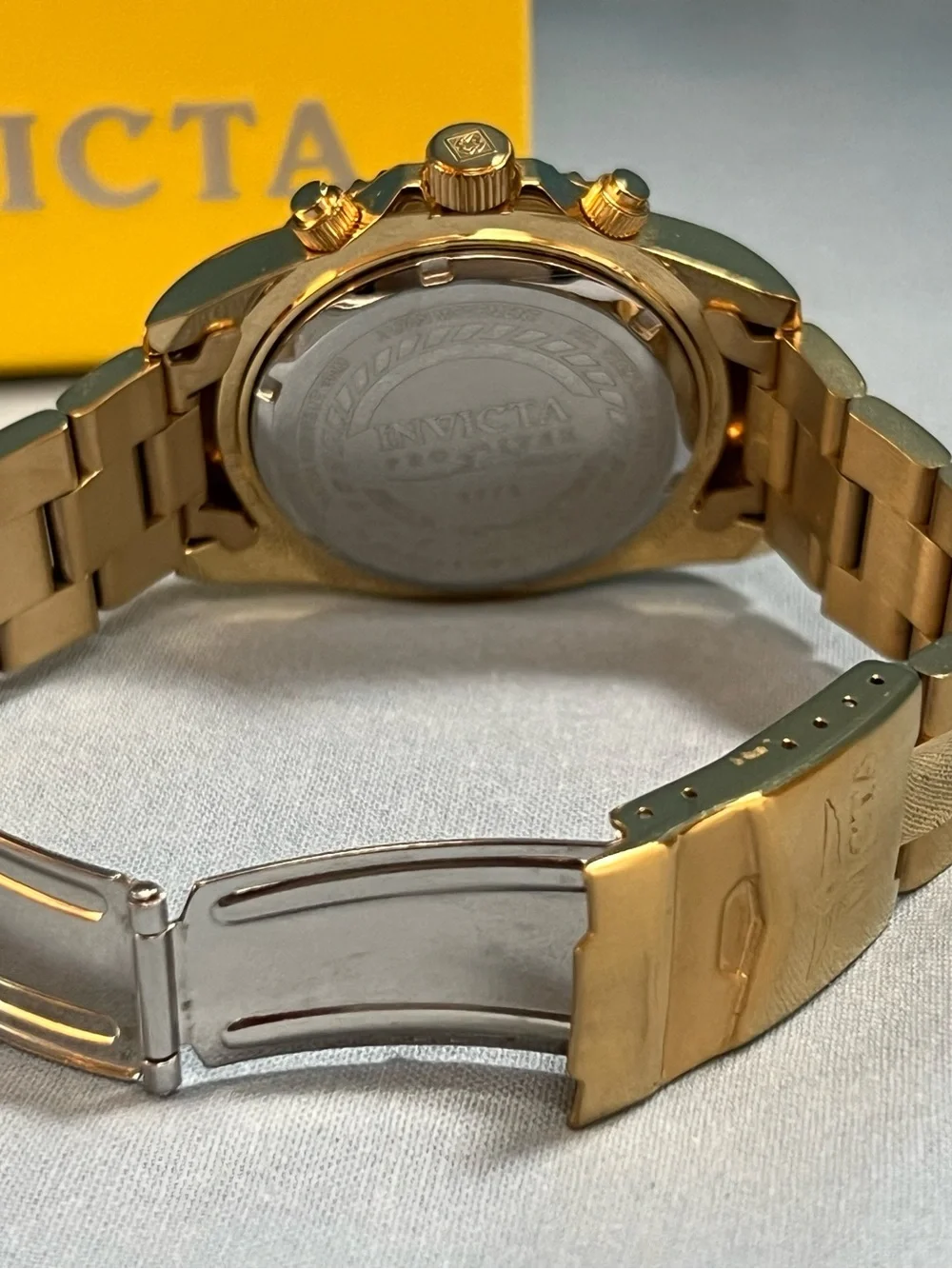 Invicta Gold and Black Brushed Metal Case Back Close-Up.  Model 1774.